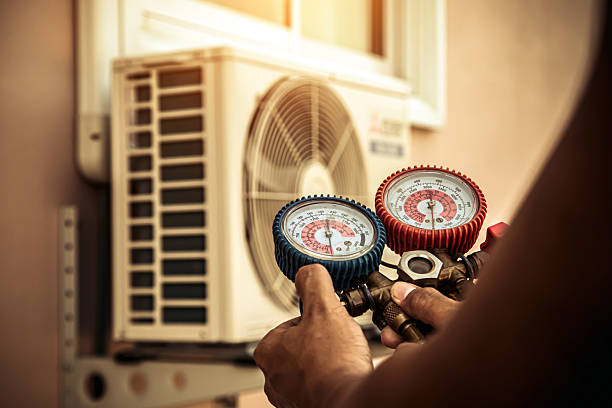 Professional Air Conditioning Service technician working in Line Lexington, PA